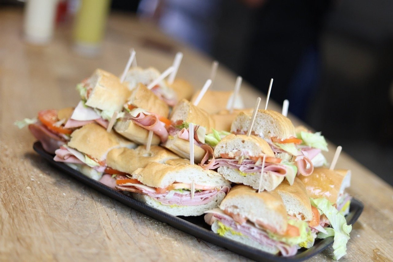 A EuroDeli catering tray of Italian baguette sandwiches